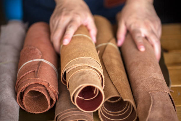 hand choosing leather materials